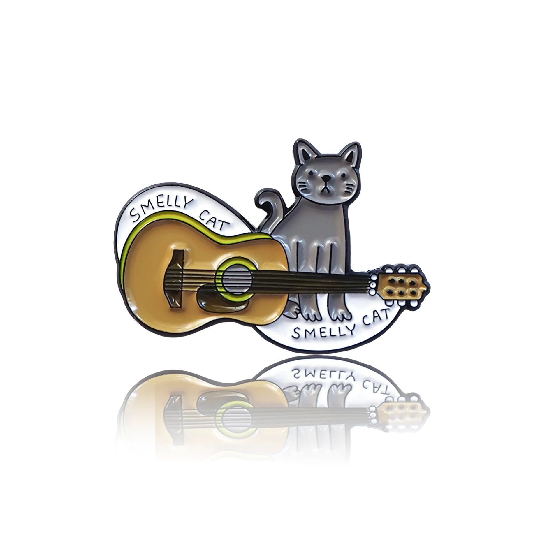 Szary kot z serialu Przyjaciele obok gitary z napisem "Smelly cat"
