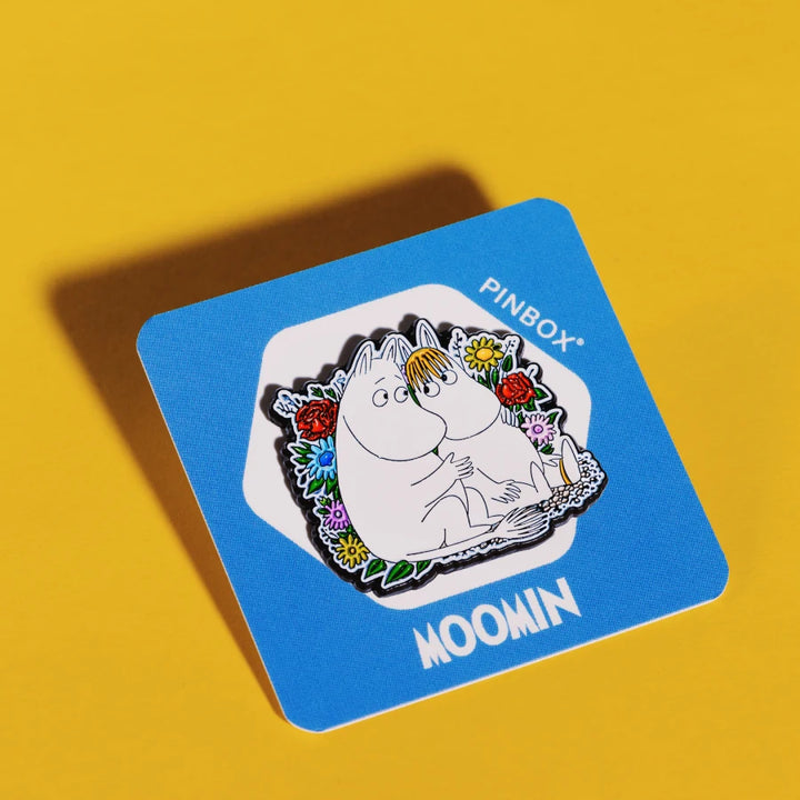 Moomintroll with a Snorkmaiden in flowers
