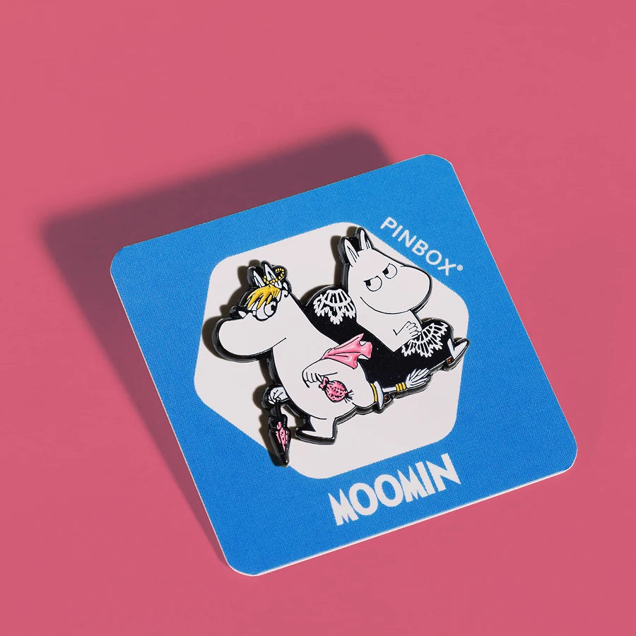 Snorkmaiden and Moomintroll in an armchair